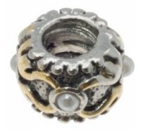 Barril grabado de 9mm con perlas incrustadas. Color niquelado y dorado